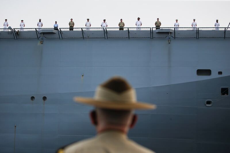 A file photo showing Australian Navy officers from the HMAS Canberra arriving at the Tanjung Priok port, as part of the military exercise Indo-Pacific Endeavour 2021, in Jakarta, Indonesia, Oct. 25, 2021. Credit: Reuters.