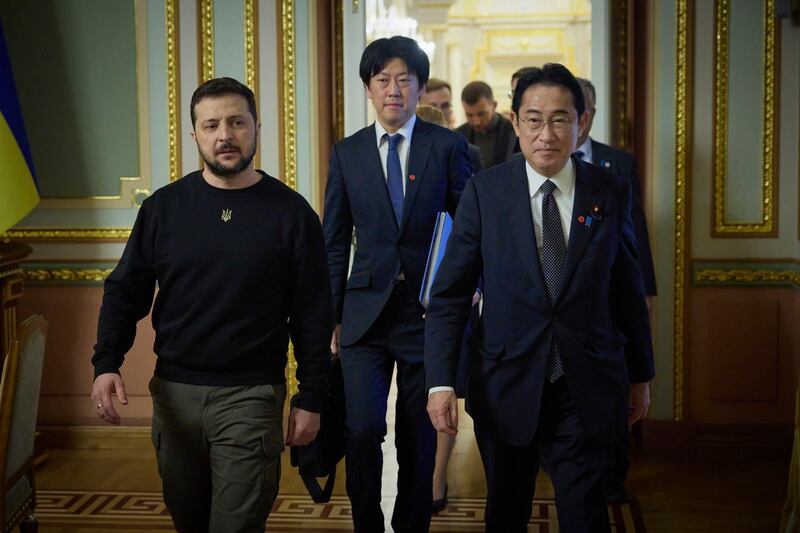 Japanese Prime Minister Fumio Kishida and Ukrainian President Volodymyr Zelenskyy walk during their meeting in Kyiv, Ukraine, Tuesday, March 21, 2023. Credit: Ukrainian Presidential Press Office via Associated Press