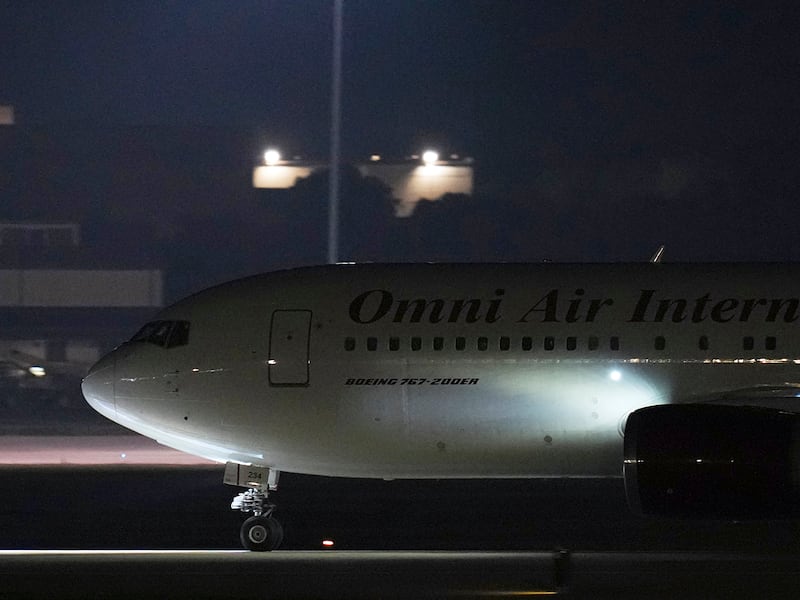 The plane with three American citizens, Mark Swidan, Kai Li and John Leung, who were imprisoned for years by China, arrives at Joint Base San Antonio Lackland, in San Antonio, Wednesday, Nov. 27, 2024.