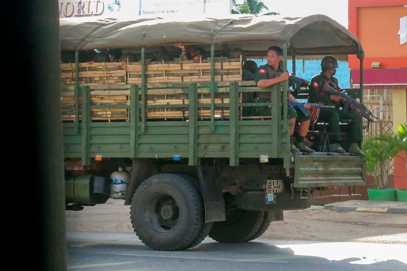 Military troops and police go on patrol at Kayah state, Myanmar, May 23, 2021. AP Photo