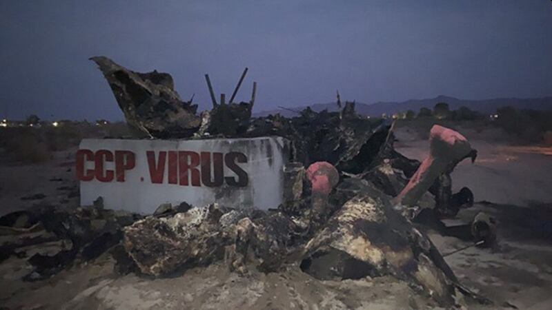 The aftermath of a fire that destroyed 'CCP Virus Statue,' a sculpture critical of China's handling of the coronavirus pandemic, at the Liberty Sculpture Park in Yermo, California, on July 23, 2021. (Chen Weiming)