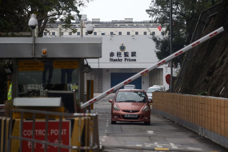 A vehicle exits the control point for Stanley Prison in Hong Kong, March 18, 2017. Credit: Tengku Bahar/AFP