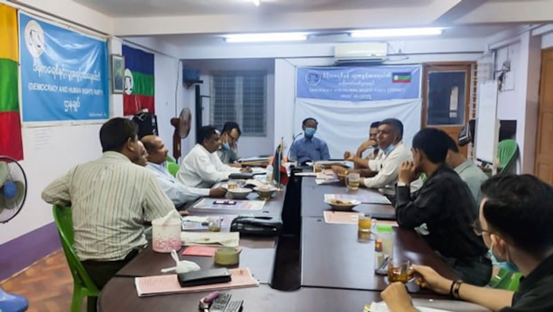 Abdul Rasheed (4th from L) and other members of the Democracy and Human Rights Party meet in the party's office in Yangon, Aug. 13, 2020.