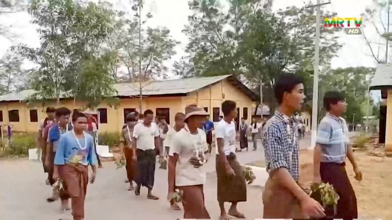 Recruits are marched to training as the Myanmar junta presses forward with conscription in an undated video still. (MRTV via AFP)