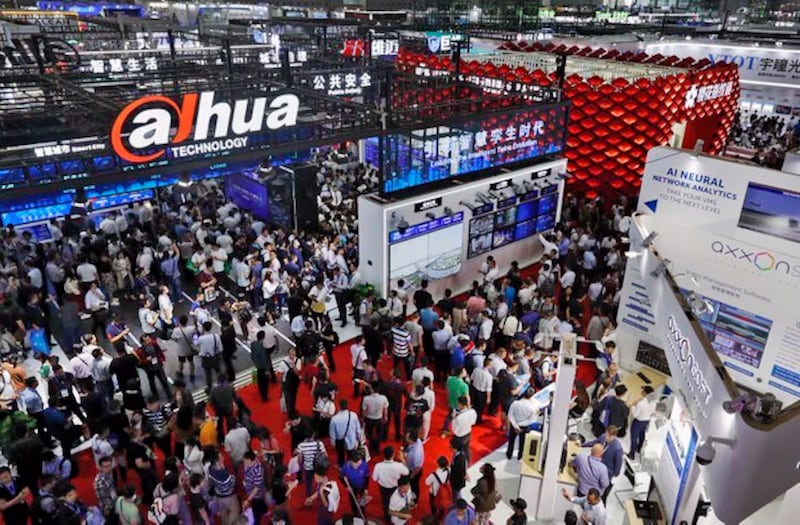 People gather at the Dahua Technology booth during the China Public Security Expo in Shenzhen, China, Oct. 29, 2019.