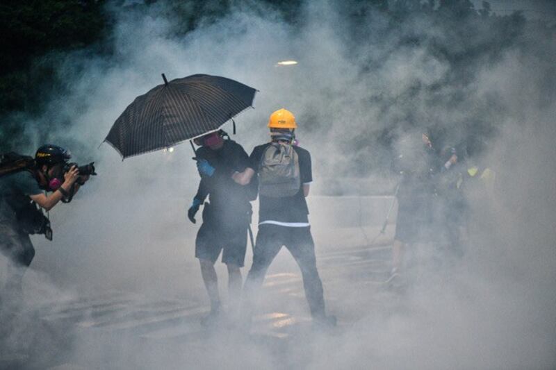 香港人做了150年的英国顺民，给中国统治不到30年就爆发血性。（法新社）