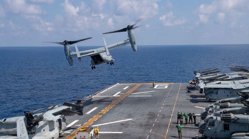 A U.S. MV-22B Osprey helicopter takes off from amphibious assault ship USS America during operations in the South China Sea, on April 19, 2020.