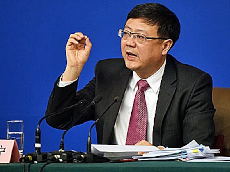 China's Minister of Environmental Protection Chen Jining speaks during a National People's Congress press conference in Beijing, March 11, 2016.