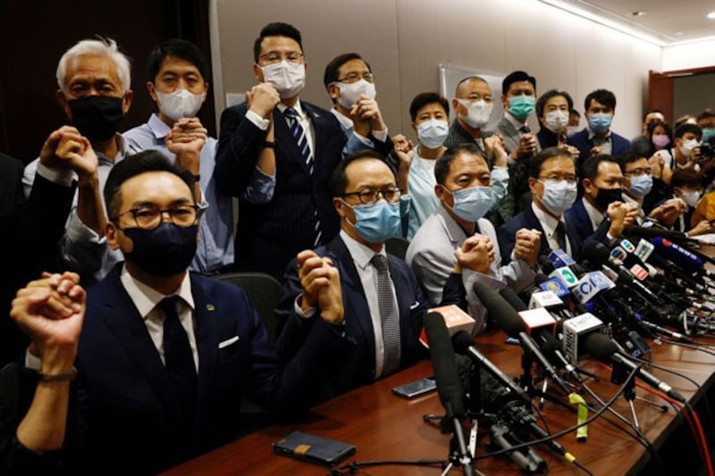 Pan-democratic legislators announce their resignation from Hong Kong's Legislative Council in Hong Kong, Nov. 11, 2020. Credit: Tyrone Siu/Reuters