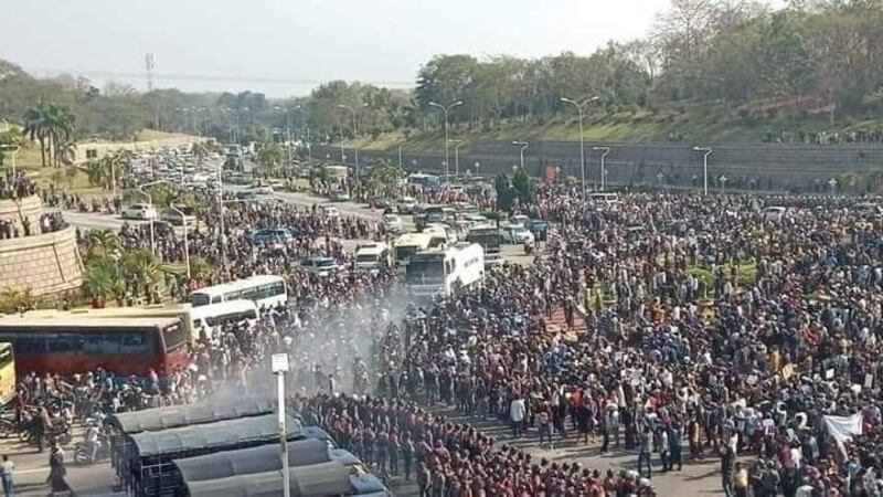 Protesters crowd an intersection in Nyapyitaw, Myanmar's capital and third-largest city, Feb. 8, 2021.