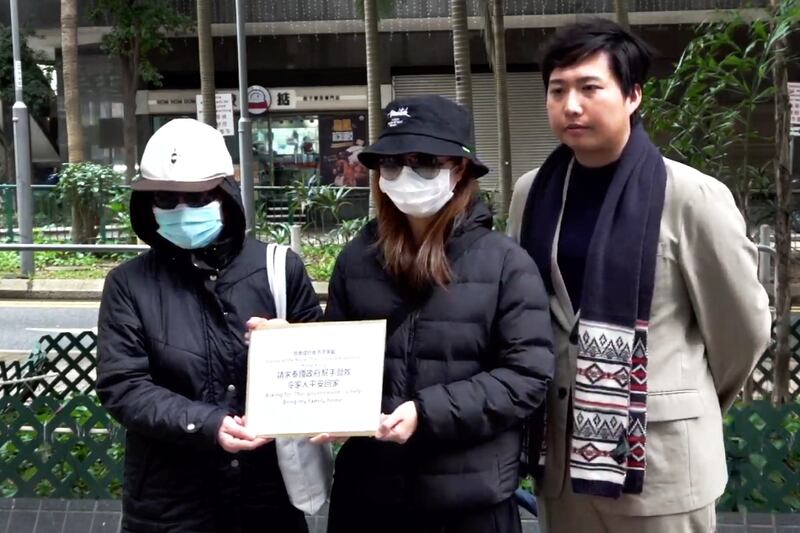 Former Hong Kong district councilor Andy Yu and family members of scam park victims petition the Thai Consulate in Hong Kong, Feb. 3, 2025.