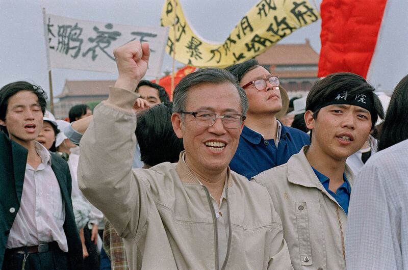 1989年5月23日，参加游行的北京市民。（美联社）