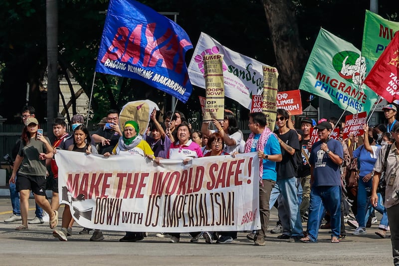 Philippine activists protest near the U.S. Embassy in Manila ahead of the inauguration of Donald Trump as U.S. president in Washington, Jan. 20, 2025. [Gerard Carreon/BenarNews]