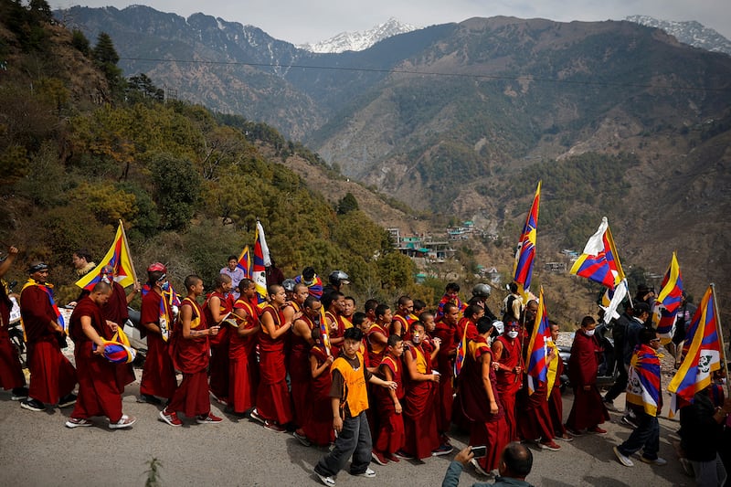 Tibetans participate in a protest march held to mark the 65th anniversary of the Tibetan uprising against Chinese rule, in Dharamsala, India, March 10, 2024.