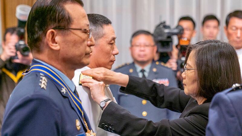 Taiwanese President Tsai Ing-wen (R) hands out military awards to officials during a ceremony in Taipei, Taiwan, April 1, 2019. Credit: Taiwan Presidential Office via AP