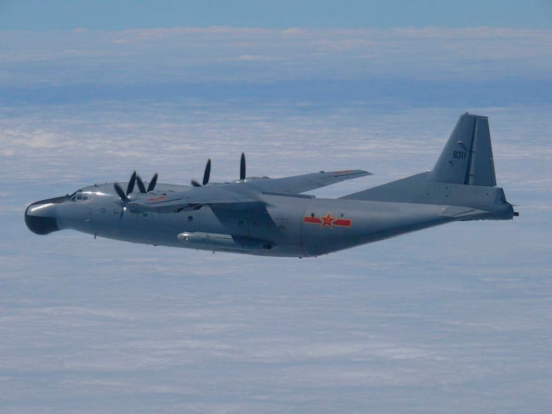 A file photo of a Y-8 Chinese military plane flying IN airspace between Okinawa prefecture's main island and the smaller Miyako island in southern Japan, taken Oct. 27, 2013, by the Japan Air Self-Defence Force.