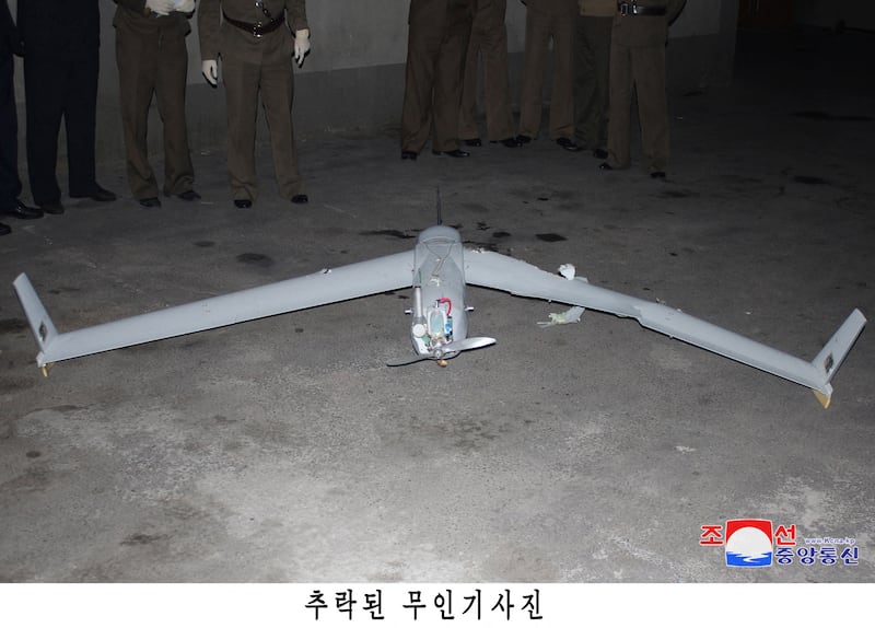 The remains of a crashed drone are shown in a photo released by North Korea’s official Korean Central News Agency on Oct. 19, 2024.