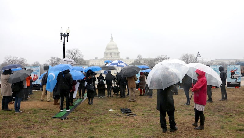 Uyghurs and other opponents of China hosting the Beijing Winter Olympic Games gather near the U.S. Capitol in Washington, D.C., Feb. 3, 2022. Credit: RFA