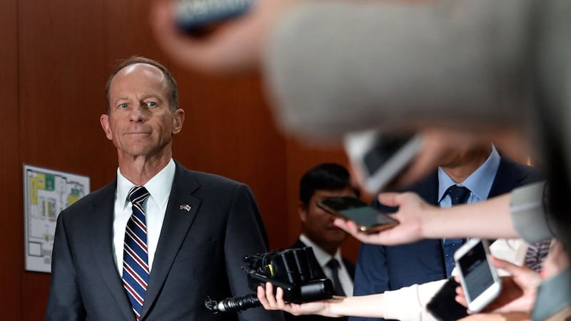 US Assistant Secretary of State for the Bureau of East Asian and Pacific Affairs David Stilwell (L) arrives after a meeting with South Korean Foreign Minister Kang Kyung-wha (not pictured) at the foreign ministry in Seoul, July 17, 2019.