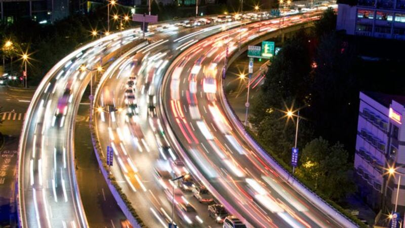 Vehicles drive along a highway in Shanghai, China, Oct. 29, 2016.