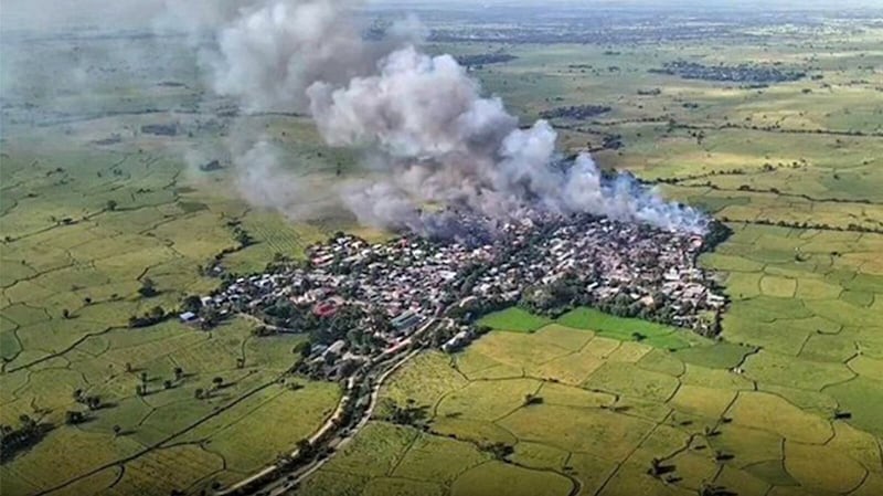 Smoke rises from Paung Hle Kone village in Khin-U township, which was burned down by junta troops, on Nov. 19, 2022.