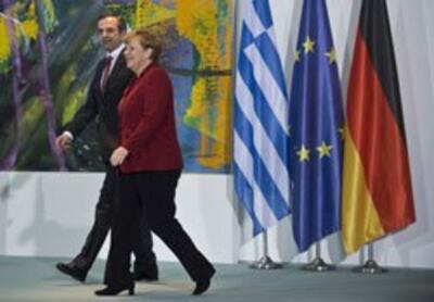 Thủ tướng Hy Lạp Antonis Samaras và Thủ tướng Angela Merkel của Đức đến một cuộc họp báo vào ngày 08 tháng 1 năm 2013 tại Berlin, Đức. 