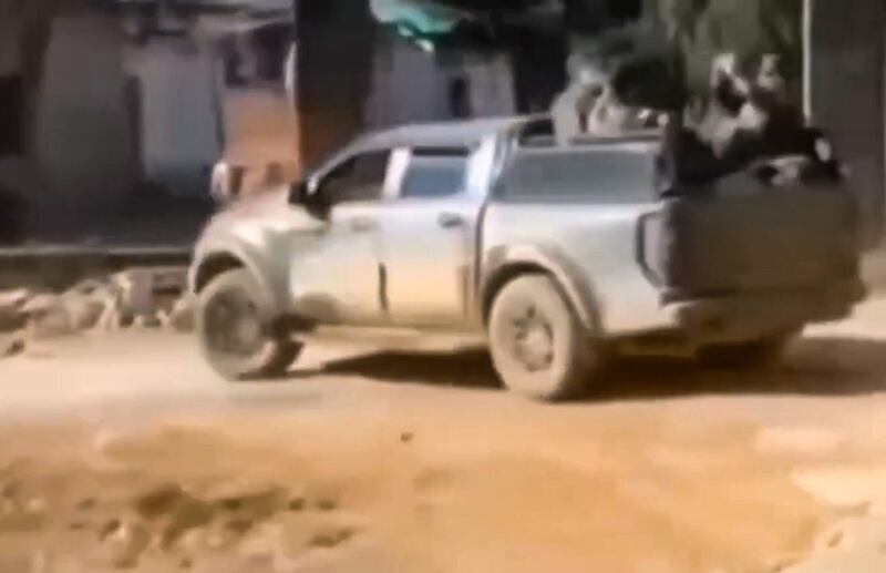 A vehicle moves through Laukkai after Myanmar National Democratic Alliance Army forces seized the military's regional command base. (Spring Revolution)