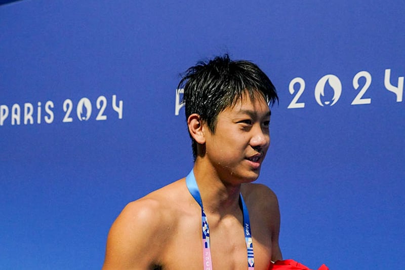 Chinese swimmer Zhang Zhanshuo declines to comment when approached by RFA Mandarin in Paris, July 29, 2024. (RFA)