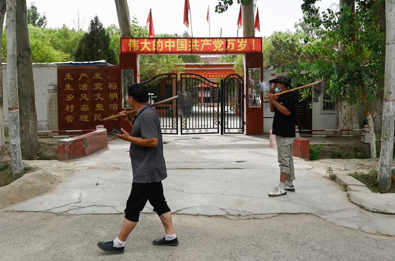 The facade of the headquarters of the Chinese Communist party, in Aral Mehelle village, outside Yarkant in northwestern China's Xinjiang region. Credit: Pedro PARDO / AFP