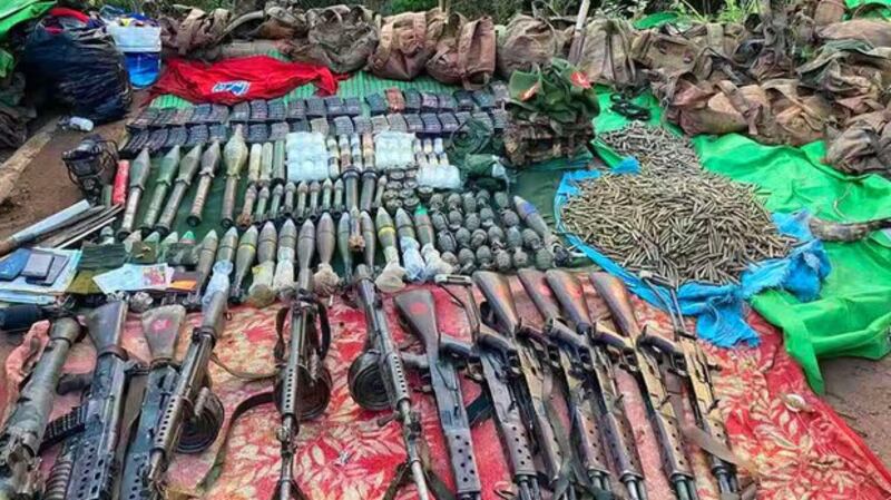 MNDAA soldiers display weapons and ammunition confiscated from government troops in northern Shan state's Mongko township, in an undated photo. MNDAA