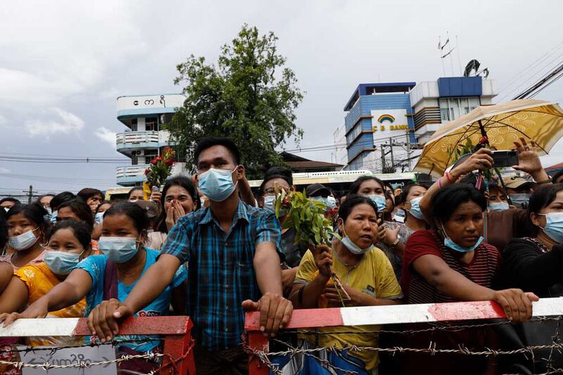 Friends and family members wait for their loved ones outside Insein Prison in Yangon. (Citizen journalist)