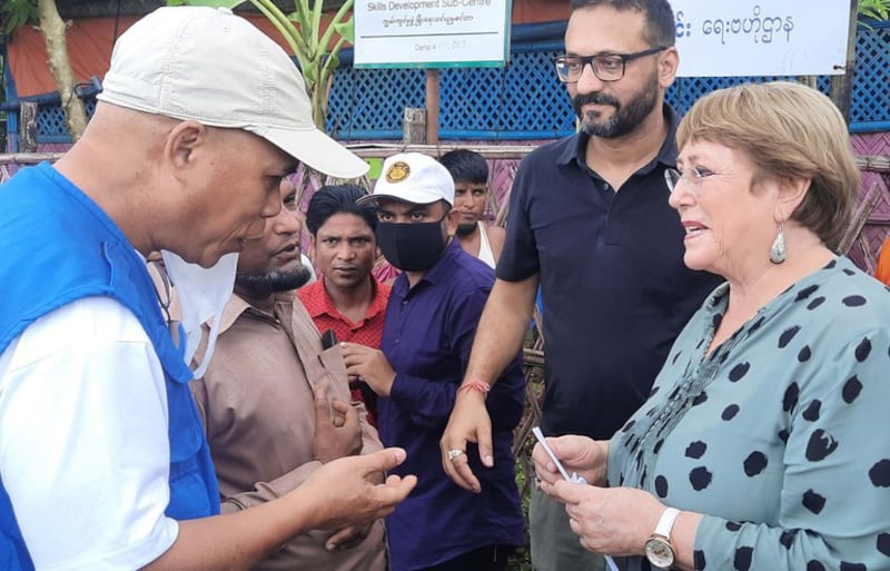 United Nations High Commissioner for Human Rights Michelle Bachelet (right) speaks with an official from the International Organization for Migration after meeting with Rohingya religious leaders at a refugee camp in Ukhia, Cox's Bazar, Bangladesh, Aug. 16, 2022. Credit: BenarNews