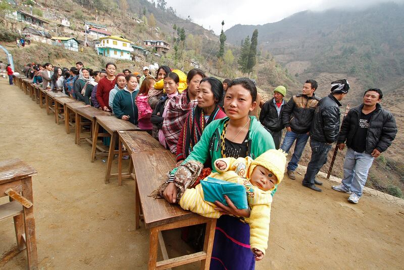 Villagers stand in a line to cast their votes at Sera village in Arunachal Pradesh, April 9, 2014. (Utpal Baruah/Reuters)