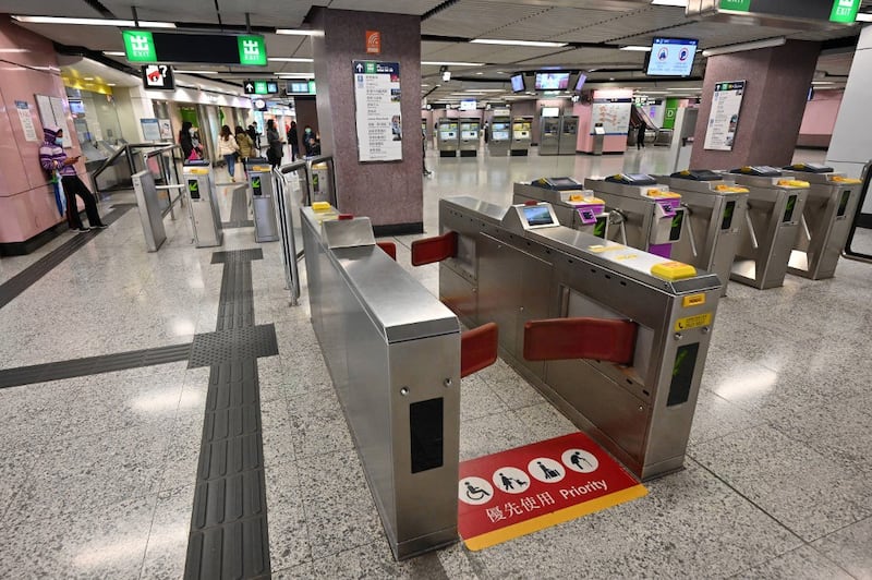 A usually busy MTR station in Hong Kong's Causeway Bay district is seen almost empty, Feb. 21, 2022. Credit: AFP