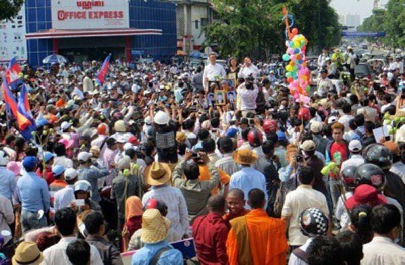 CNRP leaders address Labor Day demonstrators in Phnom Penh on May 1, 2014. Photo credit: RFA.