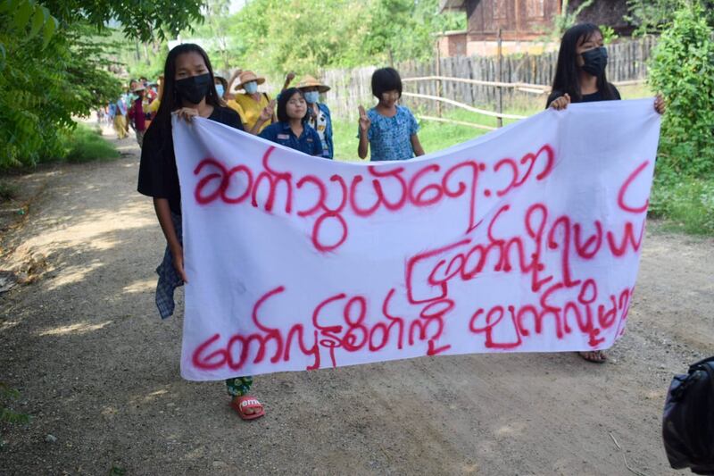 Villagers protest the junta with a banner reading 'You may cut the communications, not our revolutionary spirit.' The multi-village protest was held by residents from Yinmarbin and Salingyi townships, Sagaing region, Myanmar, June 5, 2022. Credit: Citizen Journalist