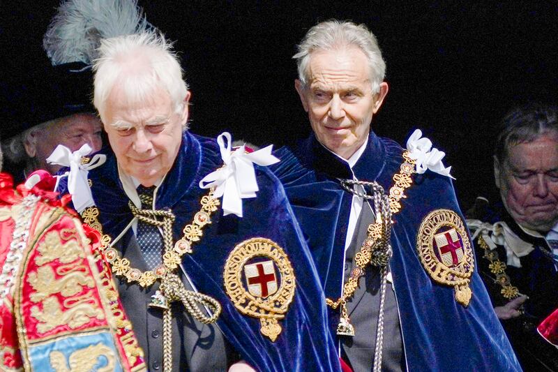 Chris Patten, left, and Sir Tony Blair depart after the Order Of The Garter Service at Windsor Castle on June 19, 2023 in Windsor, England. (Yui Mok/WPA Pool/Getty Images)