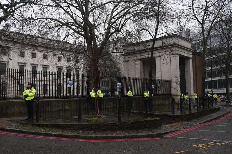 Police stand outside Royal Mint Court, the controversial site of China's proposed new "super-embassy" in London, on Feb. 8, 2025.