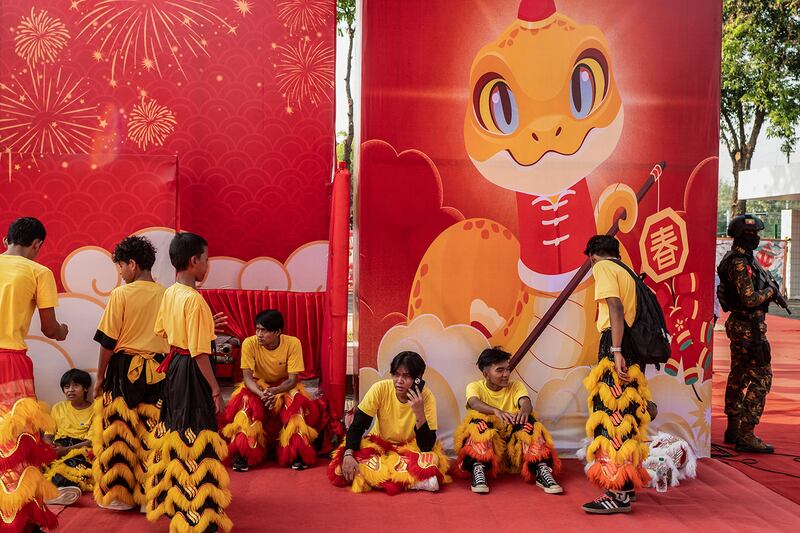 Chinese performers wait to take part in a celebration in Yangon on Jan. 25, 2025.