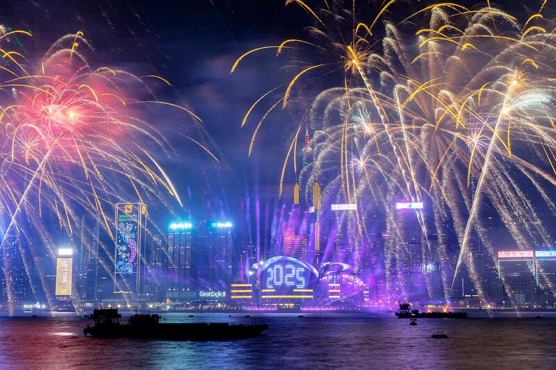 Fireworks light up the sky over Victoria Harbour in Hong Kong on Jan. 1, 2025.