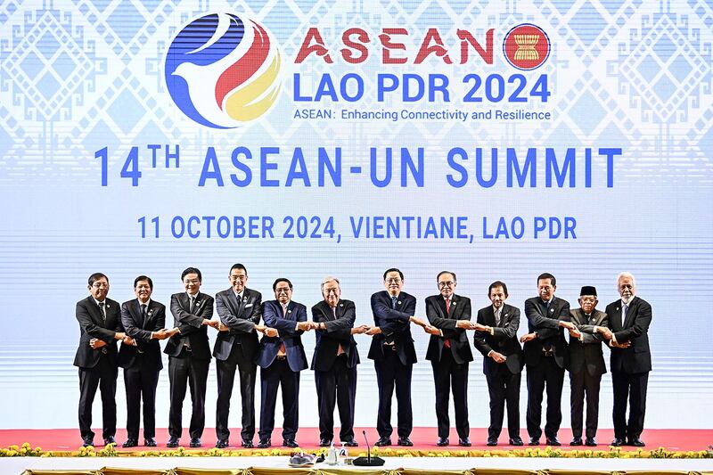 ASEAN attendees pose for a group photo at the 14th ASEAN-United Nations Summit in Vientiane on Oct. 11, 2024. (Nhac Nguen/AFP)