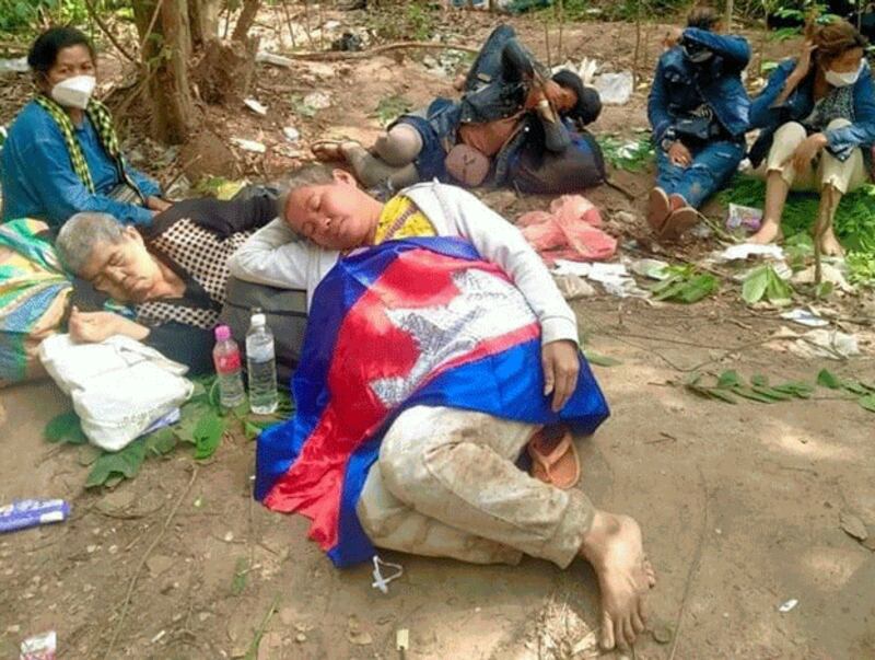 Cambodian activist Sat Pha (C) takes a nap in a jungle in Thailand where she is hiding out after being threatened in Cambodia, April 18, 2017. Credit: Theary Seng/Facebook