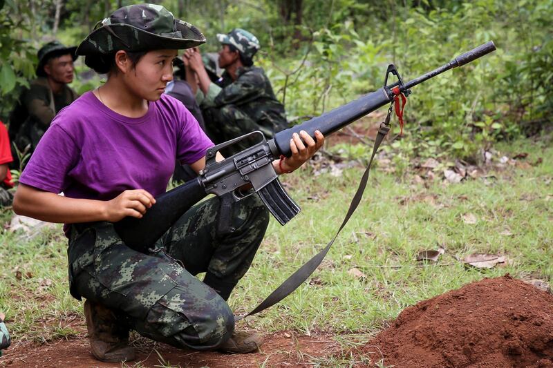 A member of the Karenni Nationalities Defence Force (KNDF) takes part in training for female special forces members in Myanmar's eastern Kayah state this year. Despite losses on the battlefield to ethnic resistance organizations and People's Defense Forces, the junta feels it can win by outlasting its opponents' will to fight. Credit: AFP/Karenni Nationalities Defense Force file photo