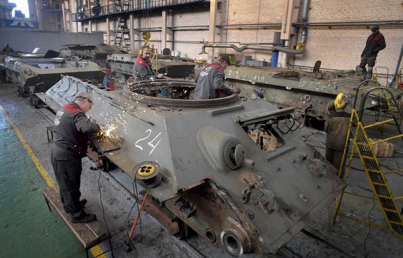 Workers at the 61st Armored Vehicle Repair Plant renovate T-34 tanks handed over by Laos to Russia, in Strelna outside St. Petersburg on Feb. 25, 2020. Credit: Olga Maltseva/AFP