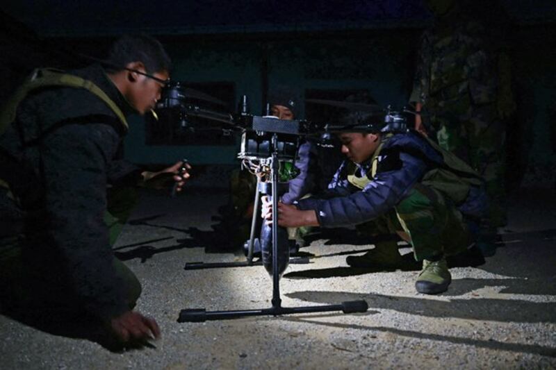 Ta'ang National Liberation Army troops prepare to launch a drone during their attack on a Myanmar junta military camp in Namhsan township in Myanmar's northern Shan state, Dec. 12, 2023. (AFP)