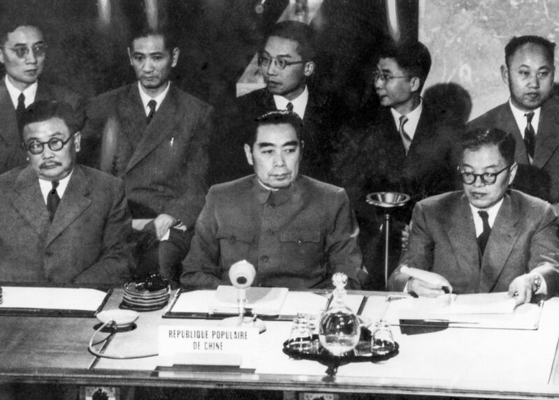 Chinese Premier Zhou Enlai, center, is flanked by Deputy Foreign Ministers Li Ke Nung, left, and Chang Wen Tien at the final session of the Geneva Peace Conference on July 21, 1954. (AP)