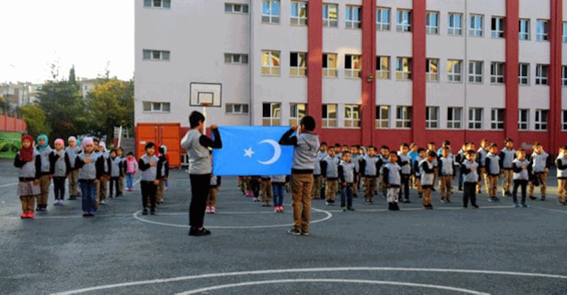 Uyghur students pledge allegiance to the flag of East Turkestan, Uyghurs' preferred name for northwestern China's Xinjiang region, at Hira Uyghur Elementary School in Turkey's capital Istanbul, Aug. 3, 2020. Credit: Hira Uyghur Elementary School