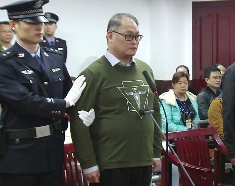 Taiwanese activist Lee Ming-cheh (center) appearing in Yueyang Intermediate People's Court, in central China's Hunan Province, Nov. 28, 2017. Credit: Yueyang Intermediate People's Court