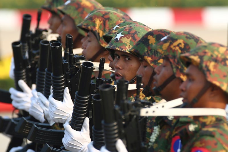 Myanmar army soldiers march during a parade to commemorate the country's 78th Armed Forces Day in Naypyidaw, March 27, 2023. Credit: Associated Press