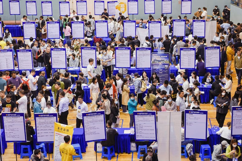 People attend a job fair in Huaian, in China's eastern Jiangsu province in May 2023. Credit: AFP